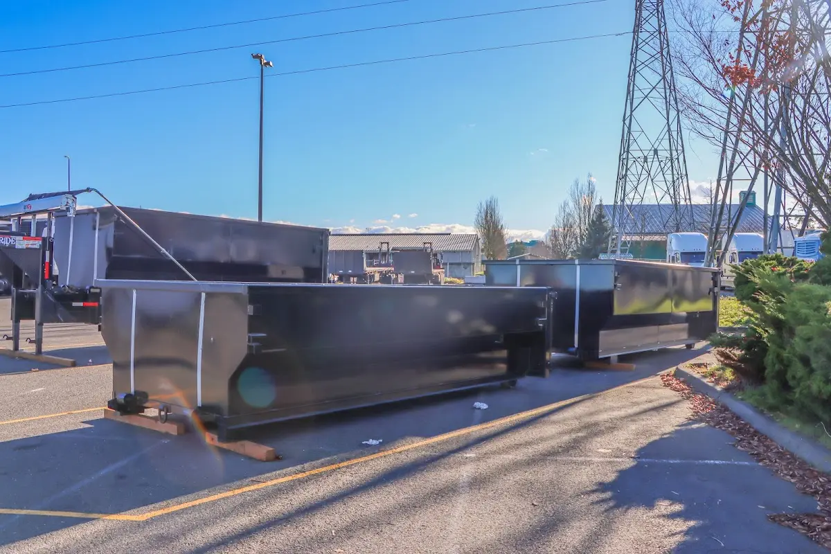 Roll-off dumpster ready for waste disposal at job site for 3 Yard Dumpster Rental in Adams